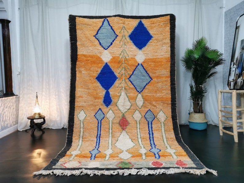 Authentic Handmade Moroccan Berber Rug 6.56 x 3.28 ft Wool: Authentic Handmade Moroccan Berber Rug 6.56 x 3.28 ft Wool Discover the beauty of this stunning authentic handmade Moroccan Berber rug, crafted from 100% natural local sheep wool. This vibrant rug fea