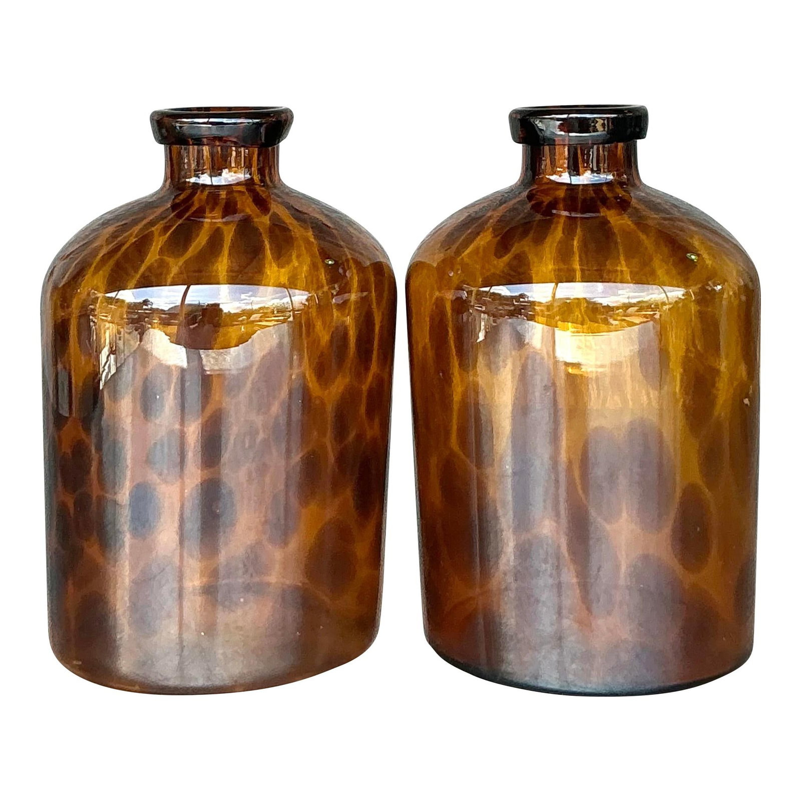 Vintage Amber Tortoise Glass Apothecary Jars Pair: Vintage Amber Tortoise Glass Apothecary Jars Pair Elevate your living space with this exquisite pair of vintage tortoise glass apothecary jars. Featuring warm amber tones and a beautifully intricate m