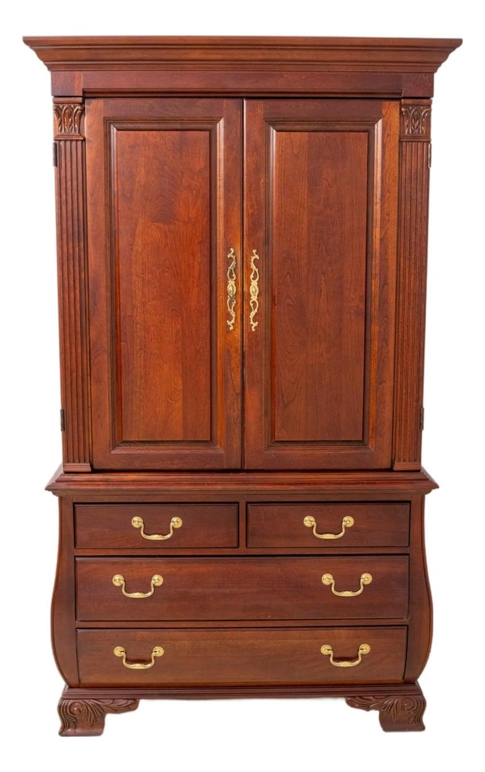 Cherry Wood Bedroom Armoire with Fitted Shelving and Raised Panel Doors: Cherry Wood Bedroom Armoire with Fitted Shelving and Raised Panel Doors This traditional style armoire is crafted from cherry wood and features a large, impressive cabinet design. It includes raised p
