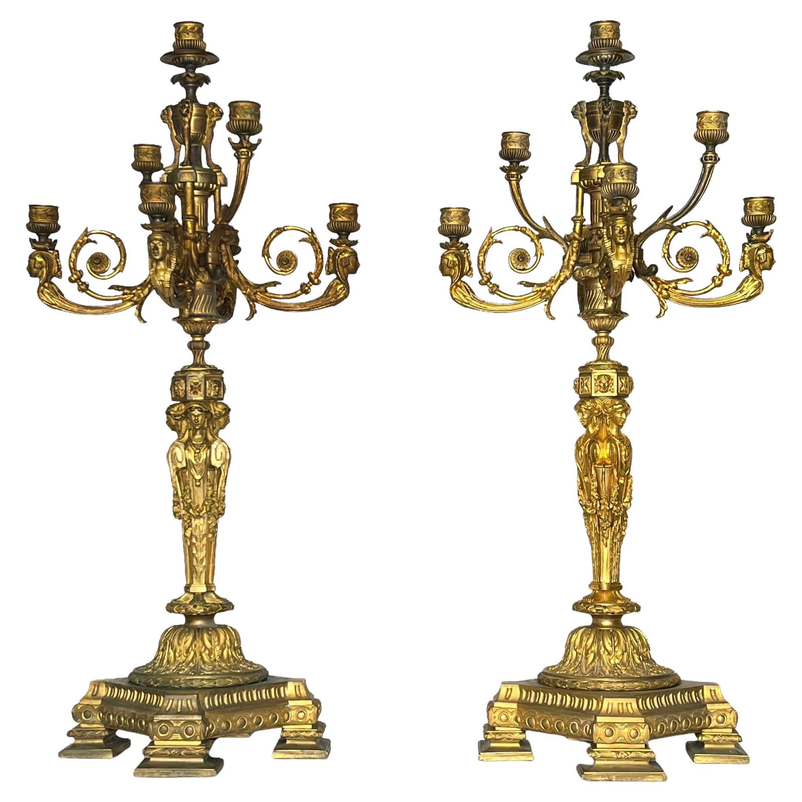 Set of Two 19th Century French Gilt Bronze Egyptian Revival Candelabra: Set of Two 19th Century French Gilt Bronze Egyptian Revival Candelabra This is a pair of large 19th century French gilt bronze candelabra in the Empire style, featuring seven lights each and finely ca