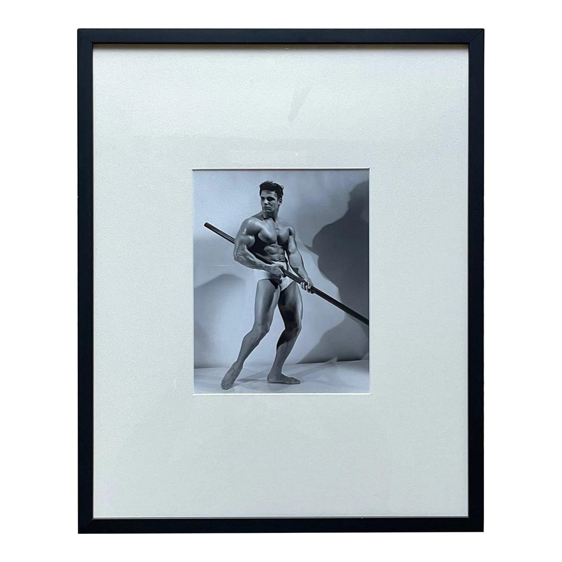 Framed Bruce of LA Black and White Male Pole Vault Photograph Mid Century: Framed Bruce of LA Black and White Male Pole Vault Photograph Mid Century This mid-20th century vintage framed photograph by Bruce of LA features a male figure in a pole-vaulting pose, exemplifying th