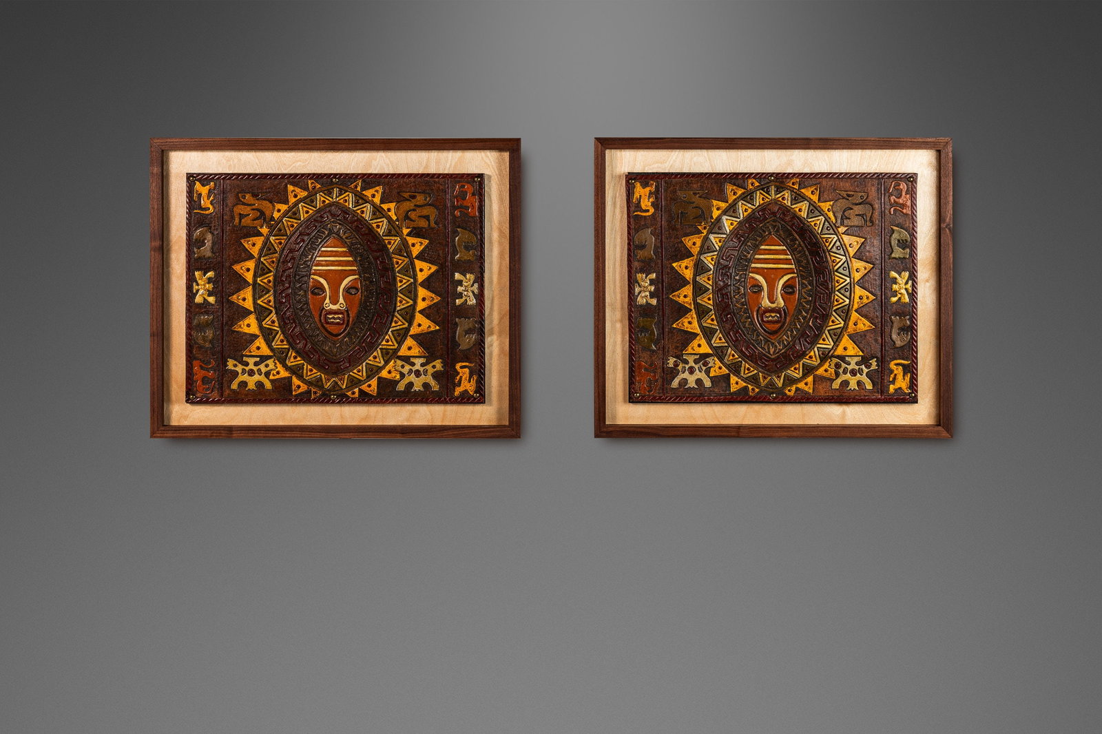 Angel Pazmino Set of 2 Framed Embossed Leather Art Ecuador 1960s: Angel Pazmino Set of 2 Framed Embossed Leather Art Ecuador 1960s This stunning set of two framed embossed leather artworks by renowned Ecuadorian artisan Angel Pazmino captures the essence of Mid-Cent