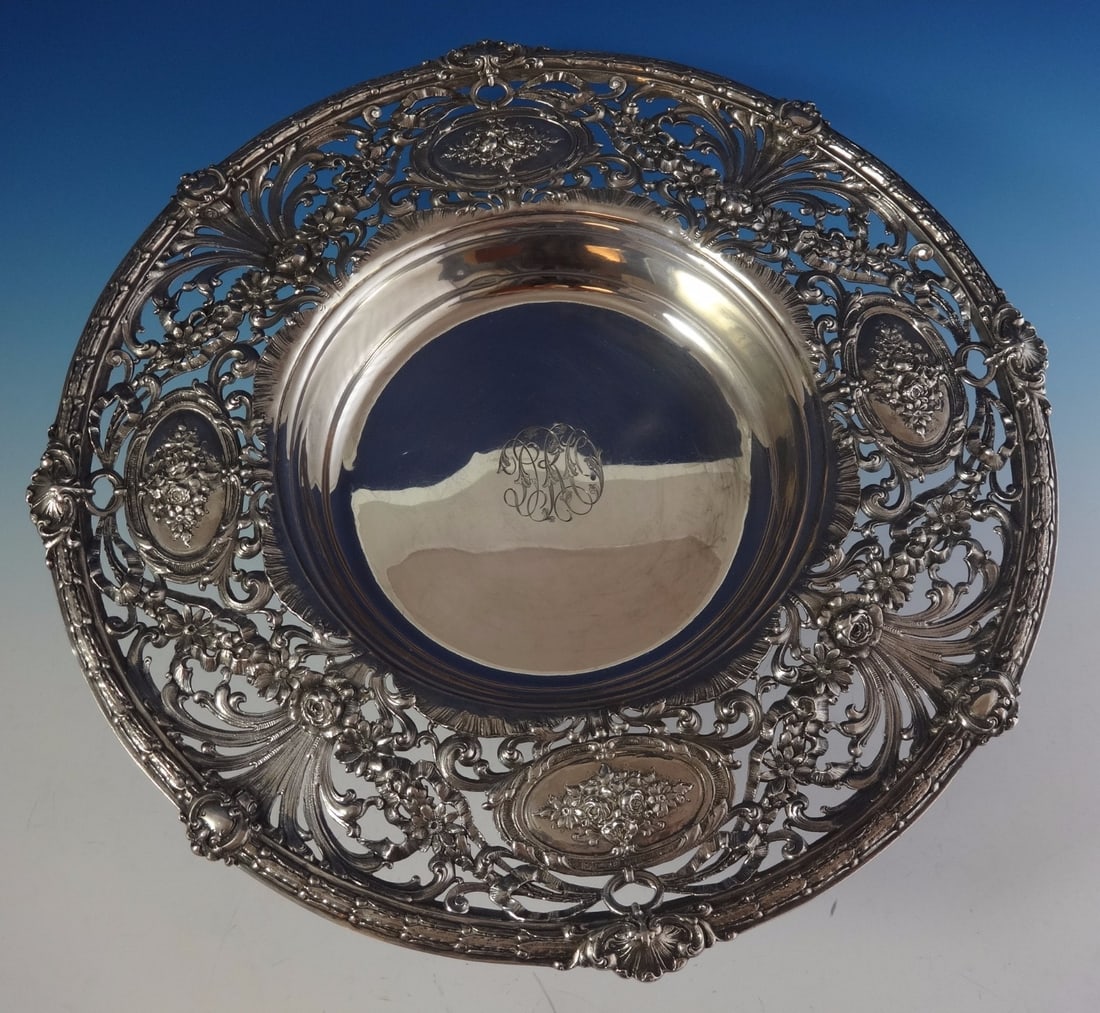 Redlich & Co. Sterling Silver Centerpiece Bowl Pierced Design 1920s: Redlich & Co. Sterling Silver Centerpiece Bowl Pierced Design 1920s This exquisite centerpiece bowl by Redlich & Co. is a stunning example of sterling silver craftsmanship from the early 20th century.