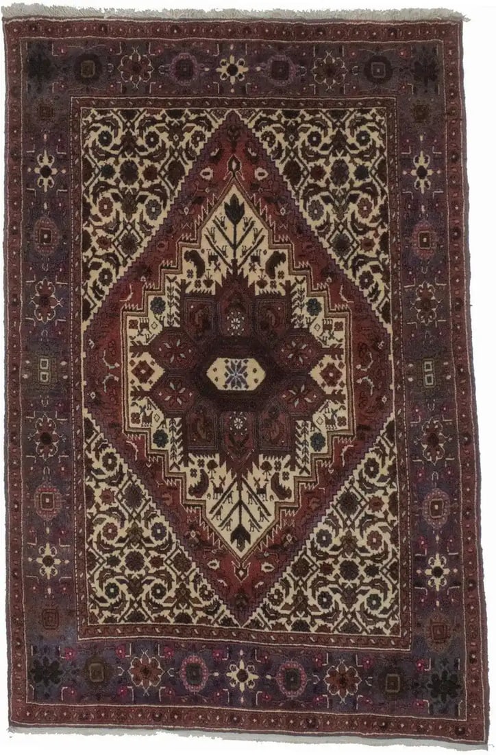 Vintage Tribal Hand-Knotted Wool Rug 3'1 x 4'10 Cream Floral Design: Vintage Tribal Hand-Knotted Wool Rug 3'1 x 4'10 Cream Floral Design This hand-knotted Oriental area rug features a vintage-inspired design with a rich color palette, including cream, red, charcoal gra