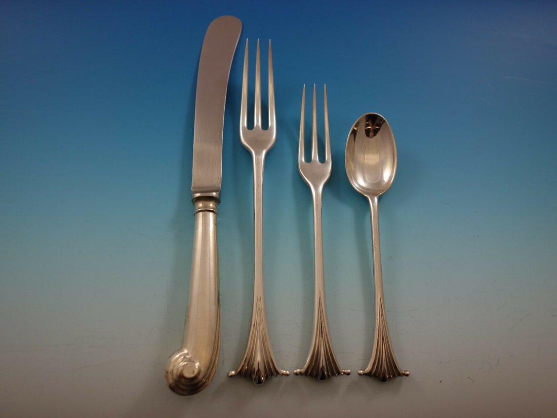 James Robinson Scroll Sterling Silver 4-Piece Dinner Place Setting: James Robinson Scroll Sterling Silver 4-Piece Dinner Place Setting Enhance your dining experience with this exquisite 4-piece dinner size place setting from James Robinson, featuring the elegant Scrol