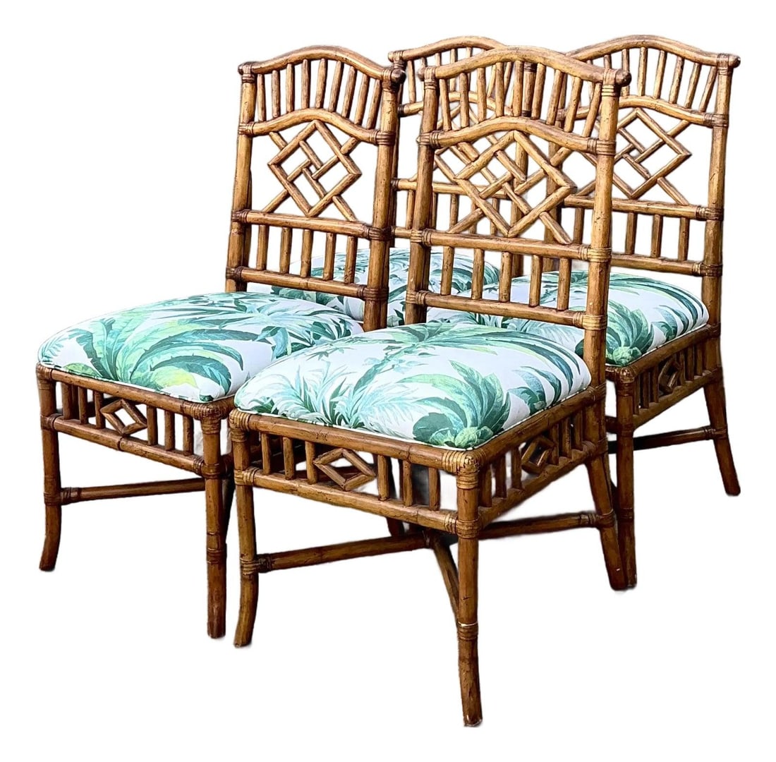 Set of 4 Manuel Canovas Palm Rattan Dining Chairs: Set of 4 Manuel Canovas Palm Rattan Dining Chairs This set of four vintage arched-back rattan dining chairs showcases Hollywood Regency elegance combined with coastal sophistication. Each chair featur