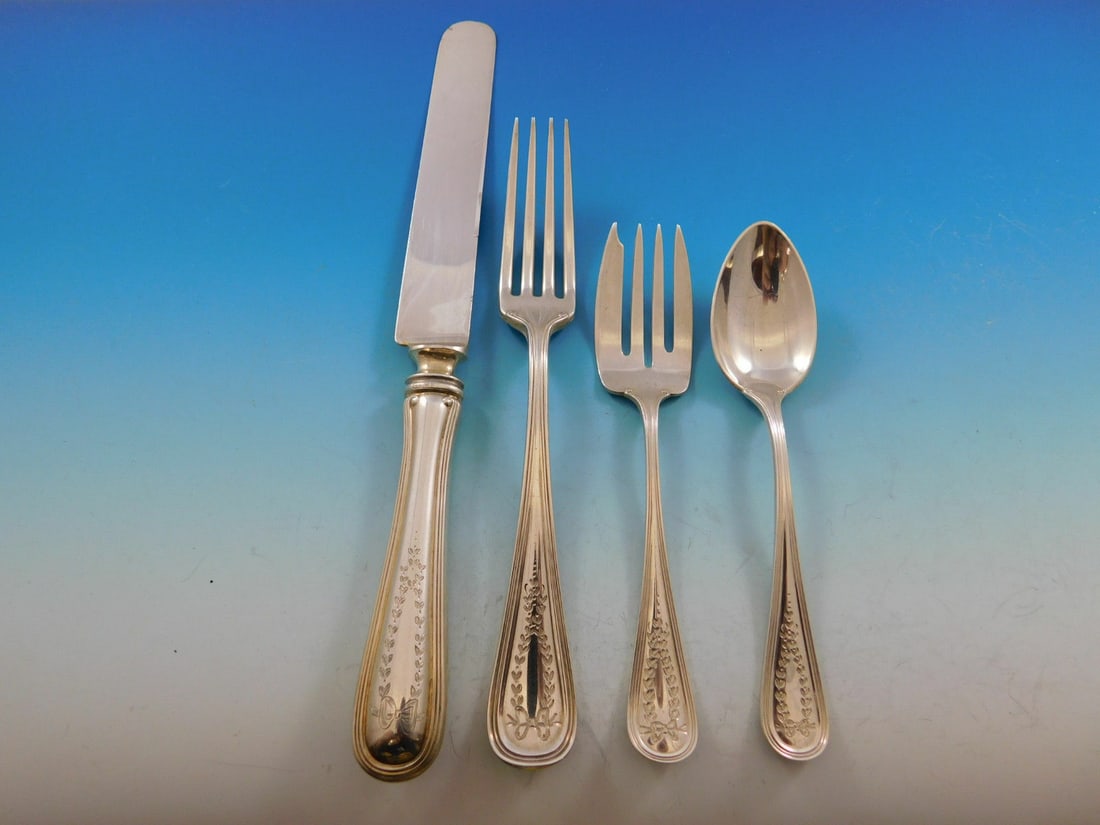 Watson Commonwealth Engraved Sterling Silver 4pc Dinner Setting: Watson Commonwealth Engraved Sterling Silver 4pc Dinner Setting Elevate your dining experience with this exquisite Commonwealth Engraved dinner place setting by Watson, crafted from high-quality sterl