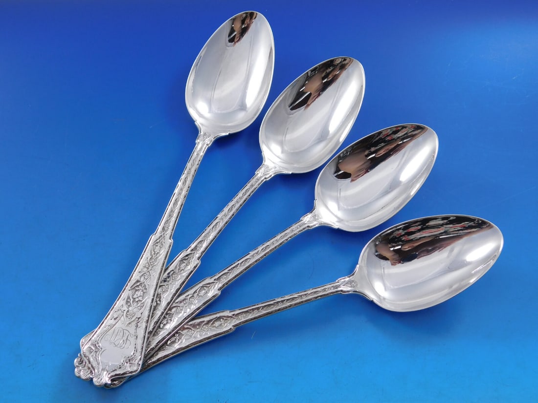 Tiffany & Co Persian Sterling Silver Serving Spoon Set of 4: Tiffany & Co Persian Sterling Silver Serving Spoon Set of 4 Enhance your dining experience with this exquisite set of four serving spoons from Tiffany & Co., featuring the elegant Persian pattern. Eac