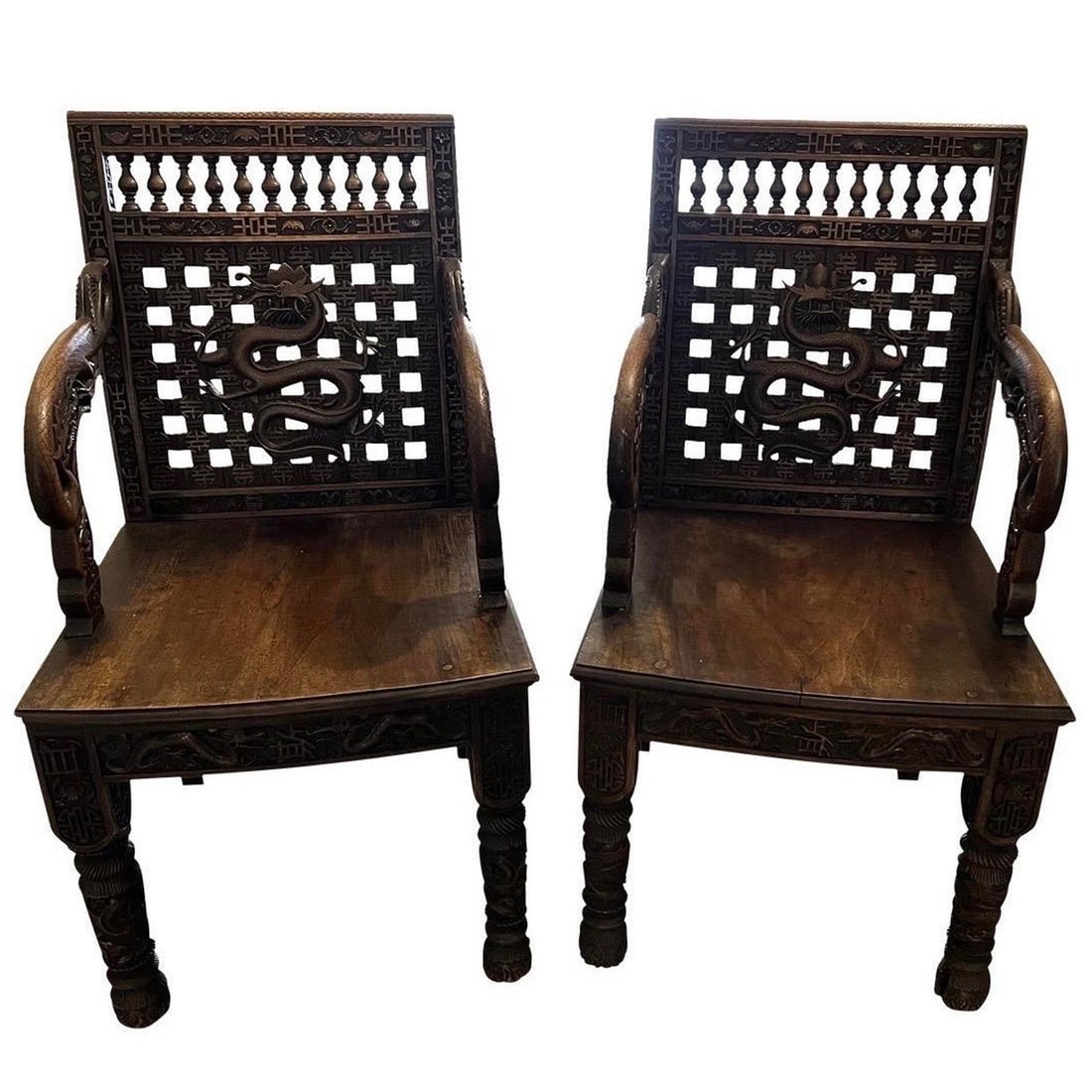 19th Century Pair of Antique Chinese Dragon Armchairs: 19th Century Pair of Antique Chinese Dragon Armchairs This exquisite pair of 19th Century antique Chinese armchairs showcases exceptional craftsmanship and intricate carvings. Adorned with dragons and