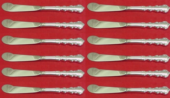 International Silver Angelique 12pc Sterling Silver Butter Spreader Set: International Silver Angelique 12pc Sterling Silver Butter Spreader Set Enhance your dining experience with this elegant 12-piece set of butter spreaders from the Angelique pattern by International St