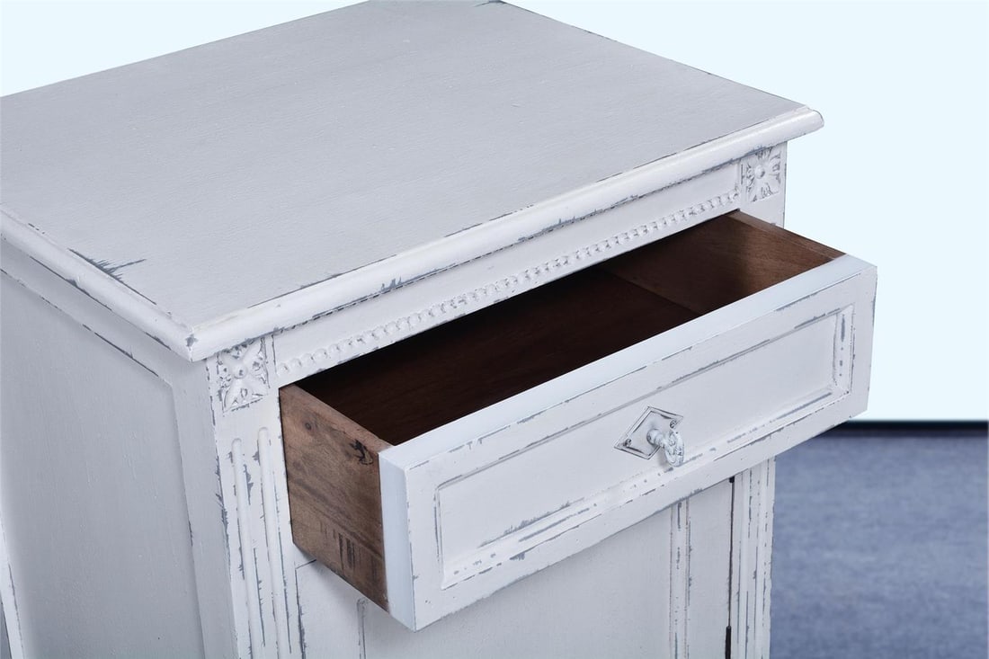 Elegant White Maria Nightstand: Elegant White Maria Nightstand Introducing the sophisticated Antique Style White Maria Nightstand, designed to enhance your bedroom decor with a touch of vintage elegance. This exquisite nightstand fe