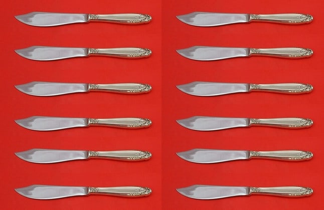 International Sterling Silver Prelude Fish Knife Set 12 pcs 8 1/4 in: International Sterling Silver Prelude Fish Knife Set 12 pcs 8 1/4 in This exquisite set of fish knives features the renowned Prelude pattern by International Sterling. Crafted from high-quality sterli