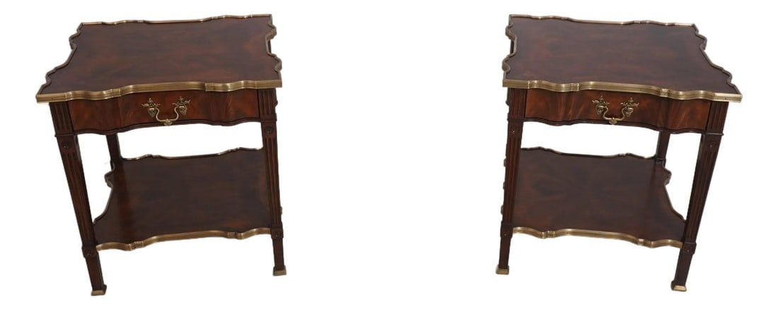 Set of Two Grand Marnier Mahogany Side Tables Model 5005-392: Set of Two Grand Marnier Mahogany Side Tables Model 5005-392 This pair of Theodore Alexander 5005-392 lamp tables features high-quality figural mahogany construction with a curved edge design and eleg