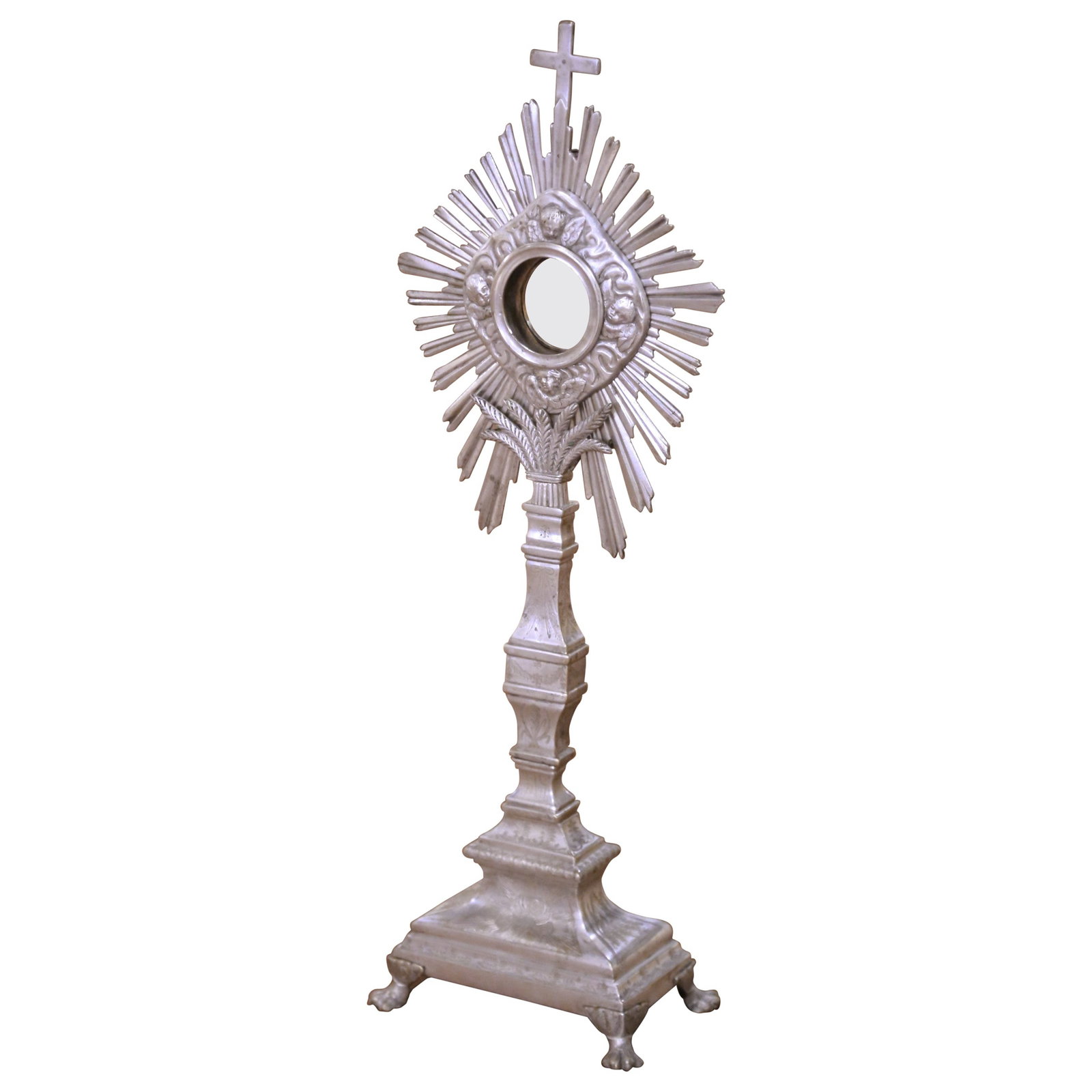 Louis XIV Style Silvered Bronze French Monstrance with Radiant Sunburst circa 1850: Louis XIV Style Silvered Bronze French Monstrance with Radiant Sunburst circa 1850 This mid-19th century French Catholic monstrance, crafted around 1850, showcases the refined artistry of ecclesiastic