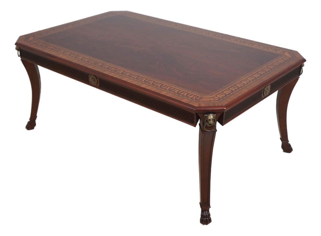 Neoclassical Mahogany Coffee Table with Inlaid Border and Claw Feet: Neoclassical Mahogany Coffee Table with Inlaid Border and Claw Feet This neoclassical cocktail coffee table features finely carved mahogany with high-quality construction and elegant inlay work throug