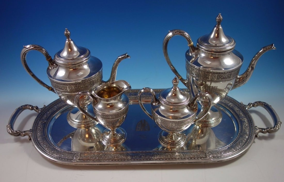 International Silver Wedgwood 5pc Sterling Silver Tea Set Vintage: International Silver Wedgwood 5pc Sterling Silver Tea Set Vintage This exquisite 5-piece tea set from the Wedgwood pattern by International Sterling is a stunning addition to any collection. Crafted f