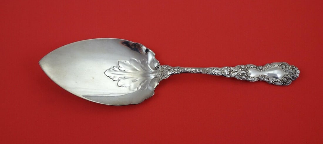 Gorham Imperial Chrysanthemum Sterling Silver Pie Server 9 3/4": Gorham Imperial Chrysanthemum Sterling Silver Pie Server 9 3/4" This exquisite pie server is a stunning example of the Imperial Chrysanthemum pattern by Gorham, crafted in sterling silver. Featuring a