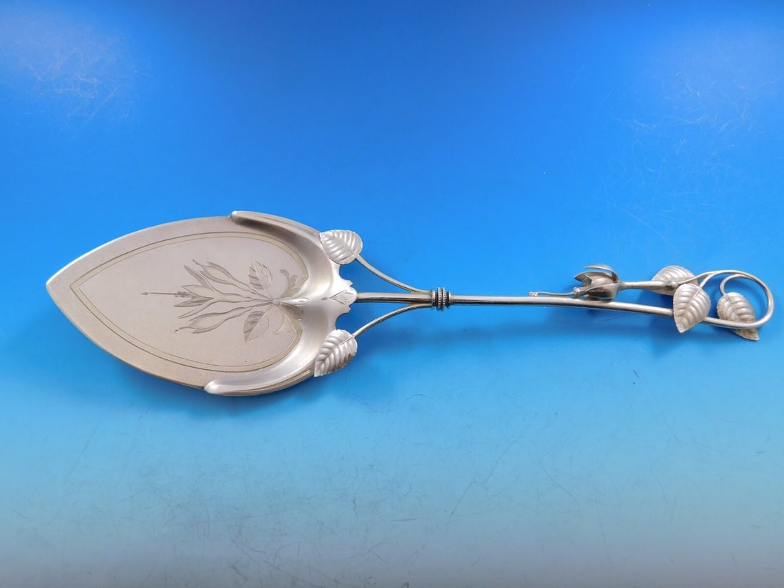 Whiting Fuchsia Sterling Silver 10.5" Figural Pie Server: Whiting Fuchsia Sterling Silver 10.5" Figural Pie Server This exquisite pie server features a flat handle designed in the Fuchsia pattern by Whiting. Crafted entirely from sterling silver, it measures