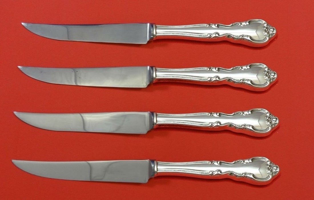 Easterling American Classic Sterling Silver Steak Knife Set 4pc Custom: Easterling American Classic Sterling Silver Steak Knife Set 4pc Custom Enhance your dining experience with this exquisite 4-piece steak knife set from the American Classic collection by Easterling. Cr