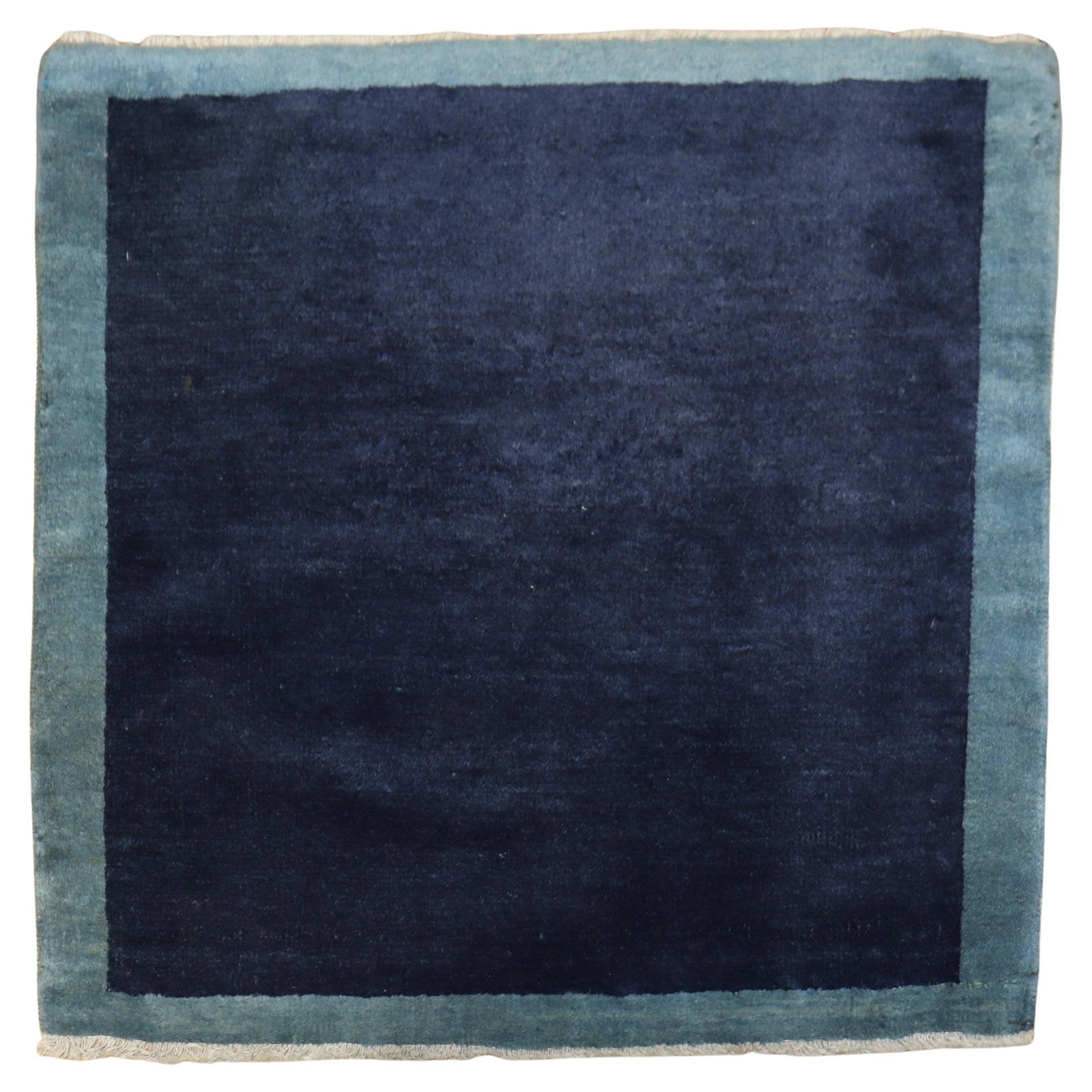 Hand-Woven Blue Minimalist Vintage Chinese Rug 27 x 29: Hand-Woven Blue Minimalist Vintage Chinese Rug 27 x 29 This unique vintage Chinese rug features a minimalist design with a soothing blue palette. Hand-woven from high-quality wool, this rug embodies t