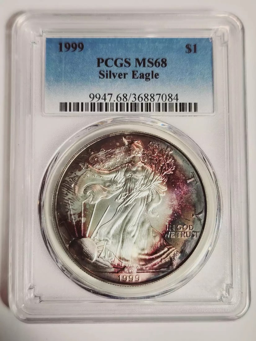 1999 P Silver Eagle PCGS MS68 Uncirculated Coin USA: 1999 P Silver Eagle PCGS MS68 Uncirculated Coin USA This 1999 P Silver Eagle is certified by PCGS with a stunning grade of MS 68, indicating it is in uncirculated condition. Minted in Philadelphia, th