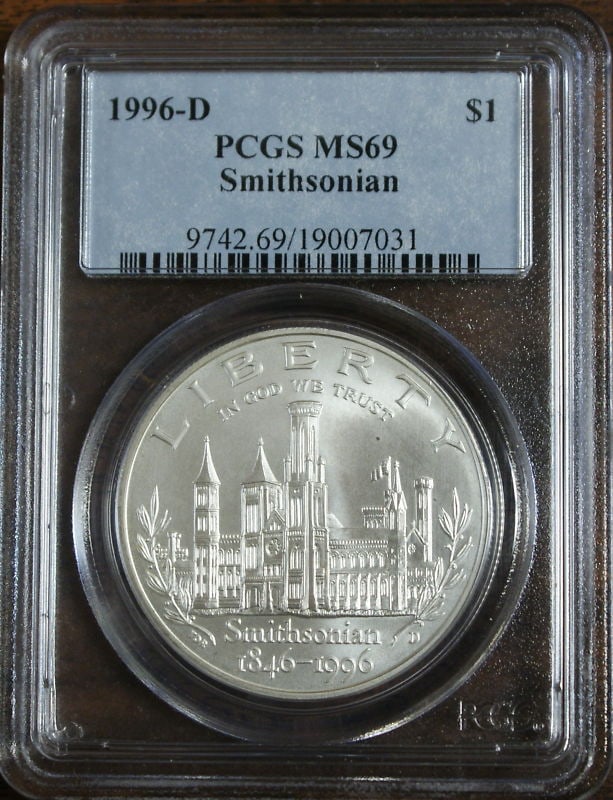 Smithsonian 1996 Denver $1 Silver Dollar PCGS MS-69 Commemorative Coin: Smithsonian 1996 Denver $1 Silver Dollar PCGS MS-69 Commemorative Coin This 1996 D $1 Smithsonian Commemorative Silver Dollar is graded MS-69 by PCGS. Issued by the Denver Mint, this uncirculated coin
