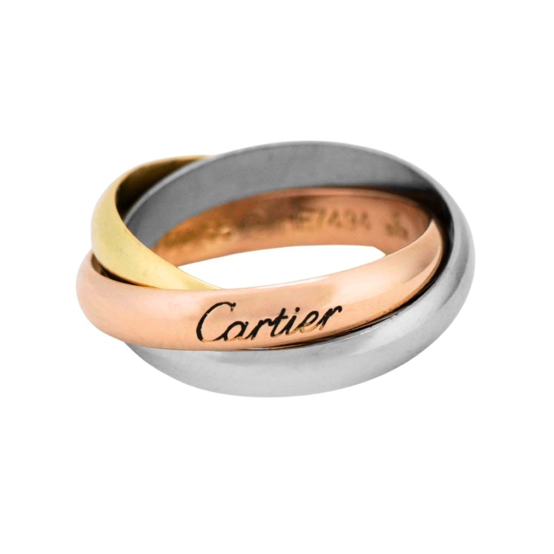 Cartier Trinity 18K Three Tone Gold Band Ring Size 6: Cartier Trinity 18K Three Tone Gold Band Ring Size 6 This Cartier Trinity Classic ring features an elegant trinity shape crafted from 18K three-tone gold, combining yellow, white, and rose gold bands.