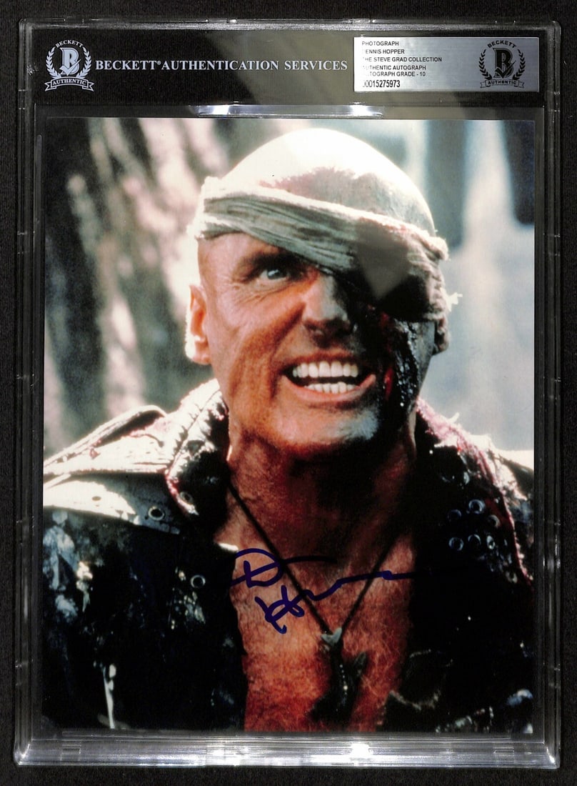 Dennis Hopper Signed Waterworld 8x10 Photo Auto Grade 10 Beckett: Dennis Hopper Signed Waterworld 8x10 Photo Auto Grade 10 Beckett This is an autographed 8x10 color photograph of Dennis Hopper, who portrayed Deacon in the film Waterworld. The signature is in blue pe