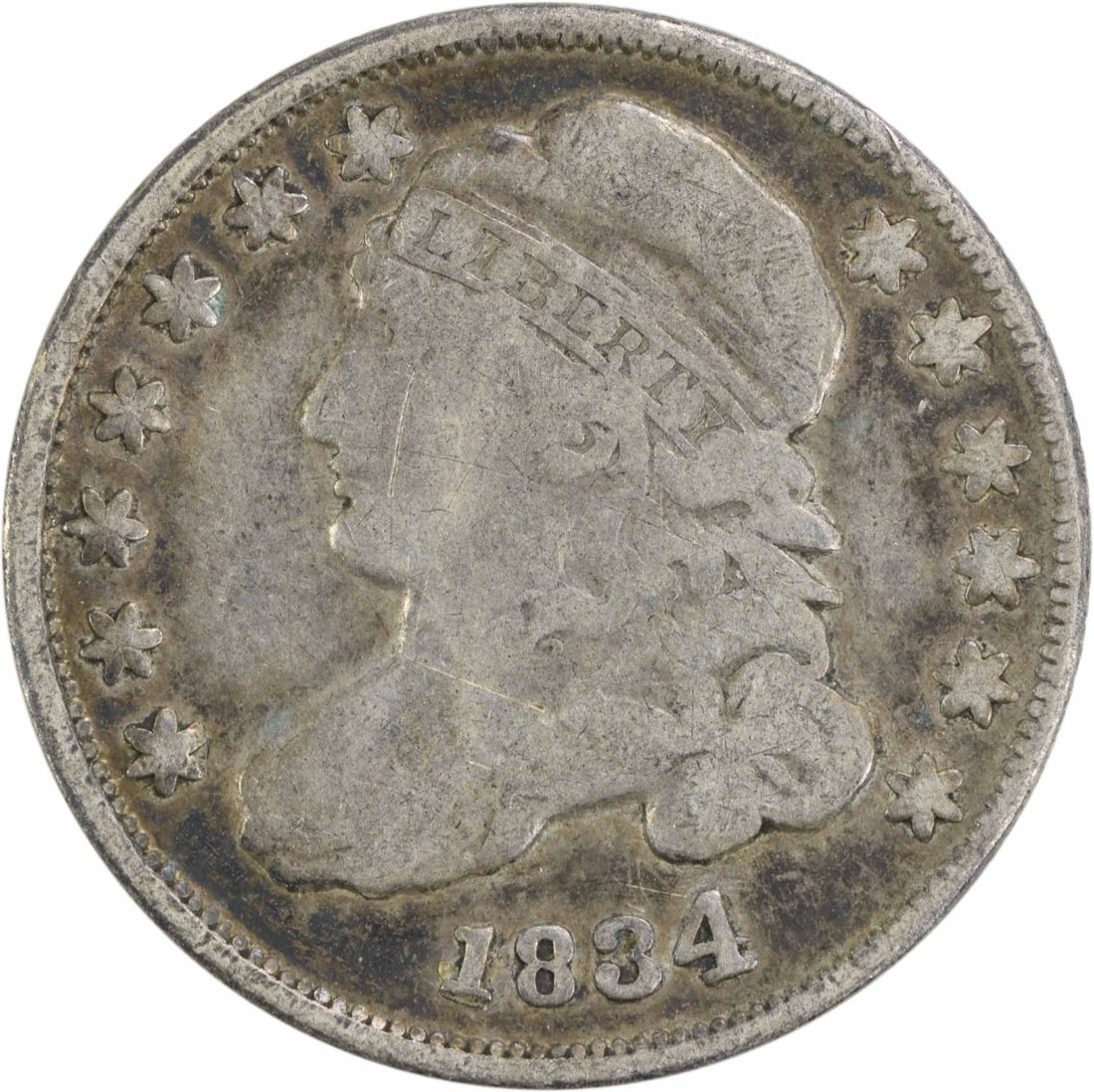 1834 Capped Bust Silver Dime 10C Uncertified Philadelphia Mint: 1834 Capped Bust Silver Dime 10C Uncertified Philadelphia Mint This 1834 Capped Bust Silver Dime is an exceptional piece for numismatic enthusiasts. Struck at the Philadelphia Mint, this coin features