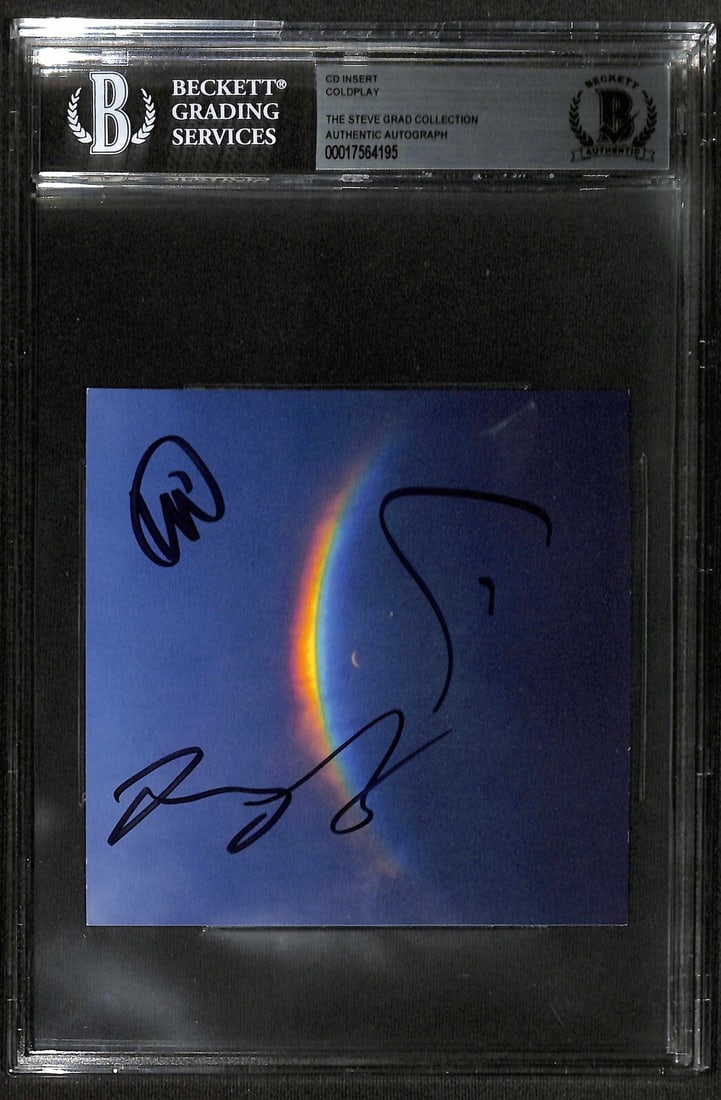 Coldplay Signed Moon Music CD Insert Beckett Authenticated: Coldplay Signed Moon Music CD Insert Beckett Authenticated This collectible features an autographed insert from Coldplay's Moon Music CD, signed by all four band members: Chris Martin, Guy Berryman, W