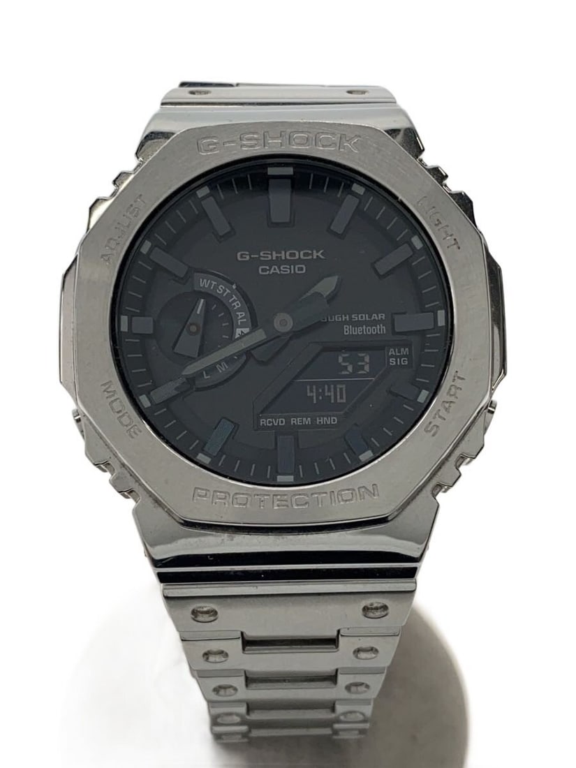 CASIO G-SHOCK GM-B2100D-1AJF Black Wristwatch: CASIO G-SHOCK GM-B2100D-1AJF Black Wristwatch This CASIO G-SHOCK GM-B2100D-1AJF men's wristwatch features a robust design with a black dial and stainless steel case. Made in Japan, it is a pre-owned (