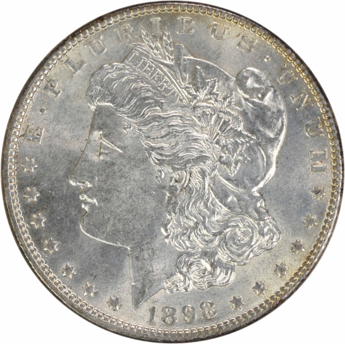 1898 Silver Morgan Dollar Choice BU Uncirculated No Mint Mark: 1898 Silver Morgan Dollar Choice BU Uncirculated No Mint Mark This 1898 Morgan Silver Dollar is a Choice BU (Brilliant Uncirculated) coin from the United States. It is composed of silver and features 