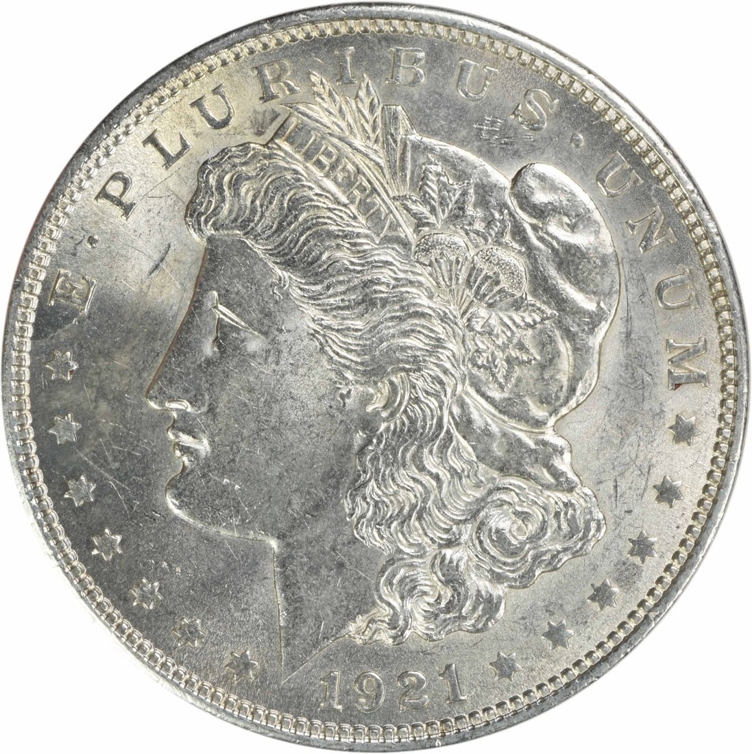 1921 Silver Morgan Dollar Brilliant Uncirculated Philadelphia No Mint Mark: 1921 Silver Morgan Dollar Brilliant Uncirculated Philadelphia No Mint Mark This 1921 Morgan Silver Dollar is an uncirculated coin with a Brilliant Uncirculated (BU) grade. It is composed of silver and