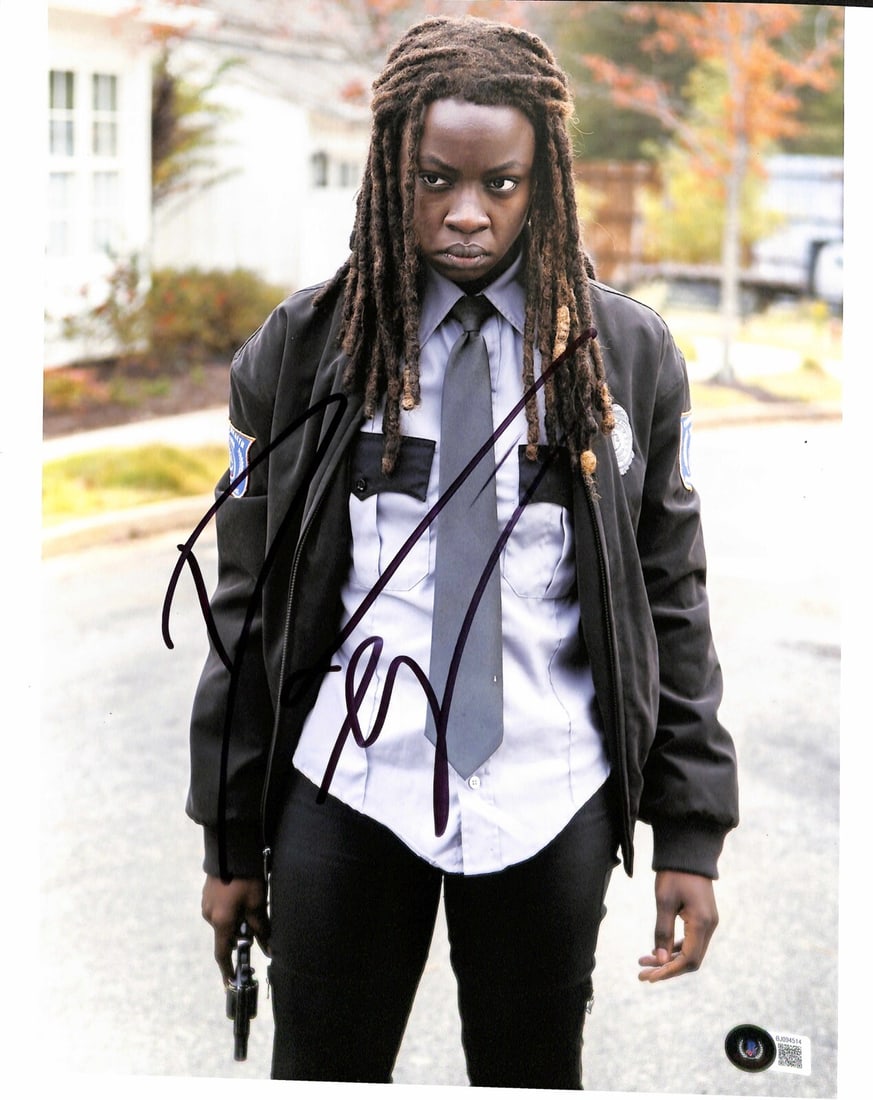 Danai Gurira Signed Michonne 11x14 Photo Beckett Authenticated: Danai Gurira Signed Michonne 11x14 Photo Beckett Authenticated This striking 11x14 photograph features Danai Gurira as Michonne from the acclaimed TV series The Walking Dead. The image is autographed 