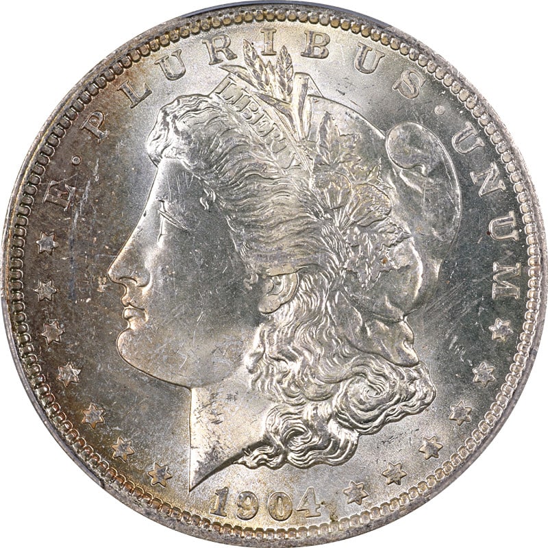 PCGS MS65 1904-O Morgan Dollar New Orleans Mint Uncirculated Silver Coin: PCGS MS65 1904-O Morgan Dollar New Orleans Mint Uncirculated Silver Coin This 1904-O Morgan Silver Dollar is certified by PCGS with a grade of MS65. Struck in New Orleans, it features superb eye appea
