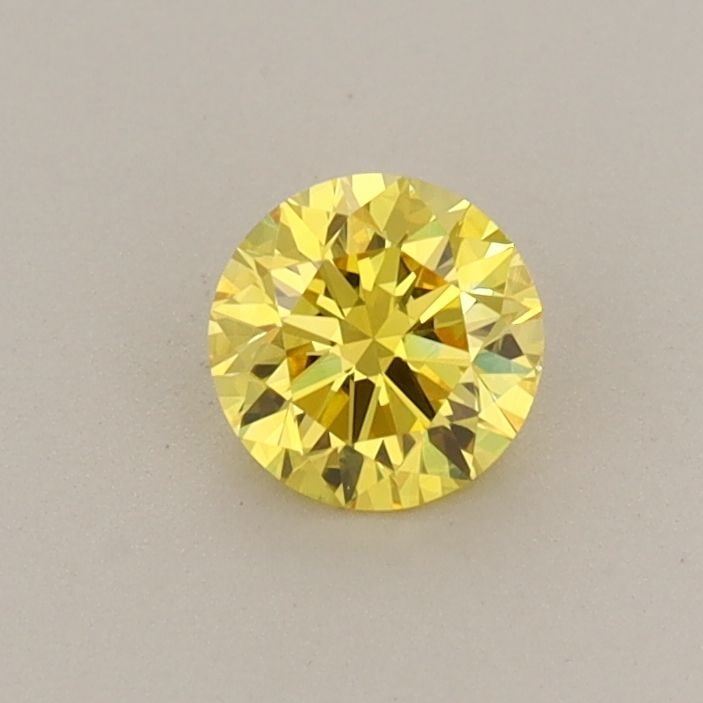 Loose Diamond - ROUND 0.38ct Fancy Vivid Yellow VVS2: Loose Diamond - ROUND 0.38ct Fancy Vivid Yellow VVS2 Source: This is a real non-mined Diamond that has been grown in a lab Shape: ROUND Carats: 0.38 Color: Fancy Vivid Yellow Certification: IGI Additi