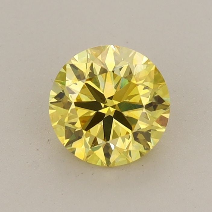 Loose Diamond - ROUND 0.66ct Fancy Vivid Yellow VVS2: Loose Diamond - ROUND 0.66ct Fancy Vivid Yellow VVS2 Source: This is a real non-mined Diamond that has been grown in a lab Shape: ROUND Carats: 0.66 Color: Fancy Vivid Yellow Certification: IGI