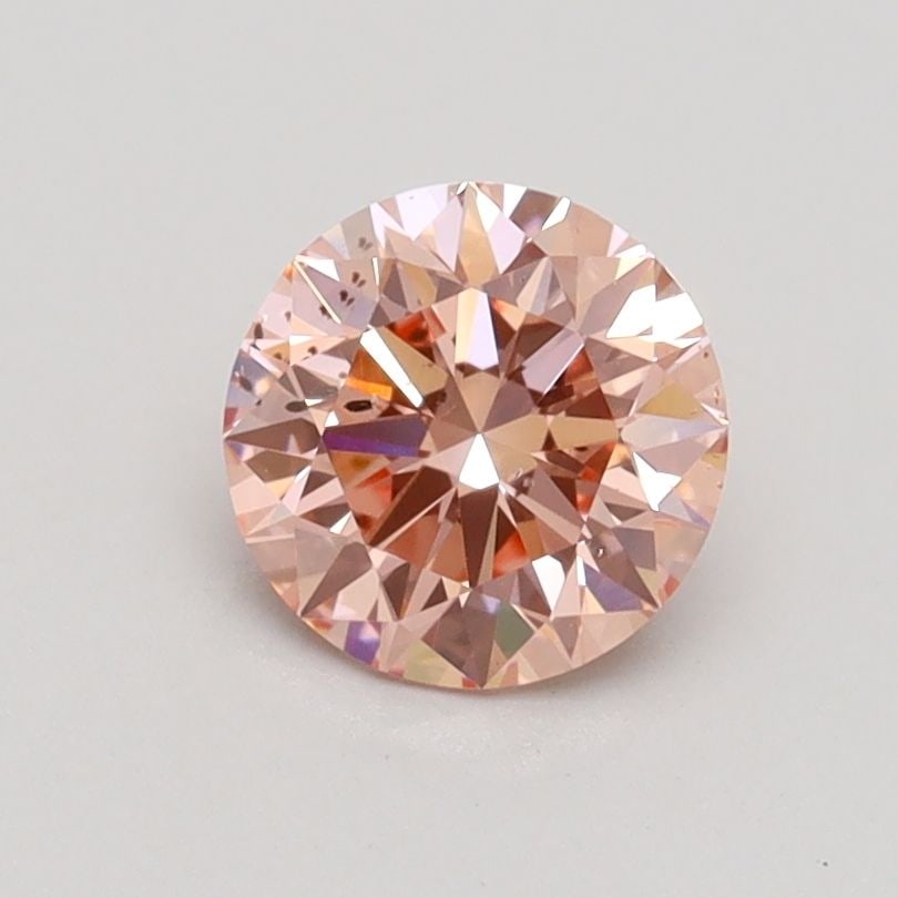 Ideal Loose Diamond - ROUND 0.88ct Fancy Intense Pink SI2: Ideal Loose Diamond - ROUND 0.88ct Fancy Intense Pink SI2 Source: This is a real non-mined Diamond that has been grown in a lab Shape: ROUND Carats: 0.88 Color: Fancy Intense Pink Certification: IGI V