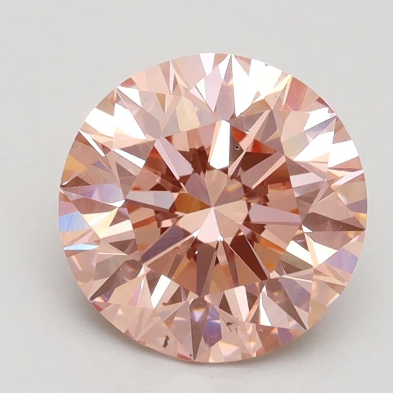 Loose Diamond - ROUND 2.33ct Fancy Vivid Pink VS2: Loose Diamond - ROUND 2.33ct Fancy Vivid Pink VS2 Source: This is a real non-mined Diamond that has been grown in a lab Shape: ROUND Carats: 2.33 Color: Fancy Vivid Pink Certification: IGI Video: