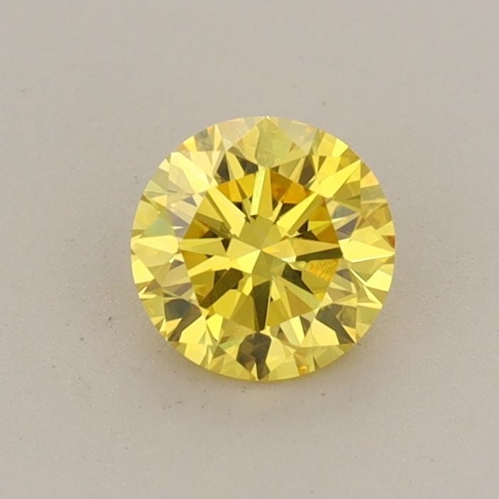 Loose Diamond - ROUND 0.5ct Fancy Vivid Yellow VVS2: Loose Diamond - ROUND 0.5ct Fancy Vivid Yellow VVS2 Source: This is a real non-mined Diamond that has been grown in a lab Shape: ROUND Carats: 0.5 Color: Fancy Vivid Yellow Certification: IGI Video: