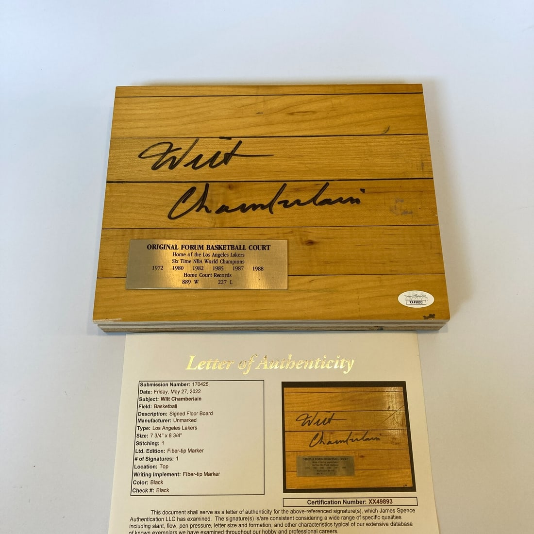 Wilt Chamberlain Signed Lakers Court Section with JSA COA 8x9: Wilt Chamberlain Signed Lakers Court Section with JSA COA 8x9 This remarkable item features a large section of the Forum basketball court, measuring approximately 8x9 inches, which served as the home 