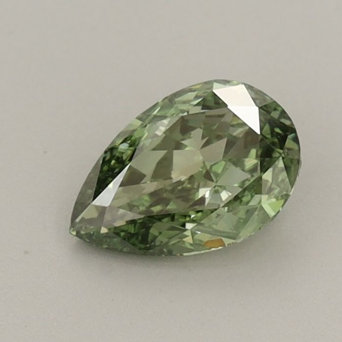 Loose Diamond - PEAR 0.6ct Fancy Vivid Green VS2: Loose Diamond - PEAR 0.6ct Fancy Vivid Green VS2 Source: This is a real non-mined Diamond that has been grown in a lab Shape: PEAR Carats: 0.6 Color: Fancy Vivid Green Certification: IGI Video: