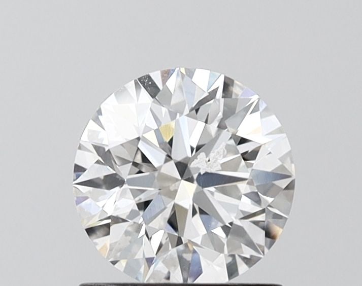 Ideal Loose Diamond - ROUND 1.0ct D VVS2: Ideal Loose Diamond - ROUND 1.0ct D VVS2 Source: This is a real non-mined Diamond that has been grown in a lab Shape: ROUND Carats: 1.0 Color: D Clarity: VVS2 Certification: IGI Video: