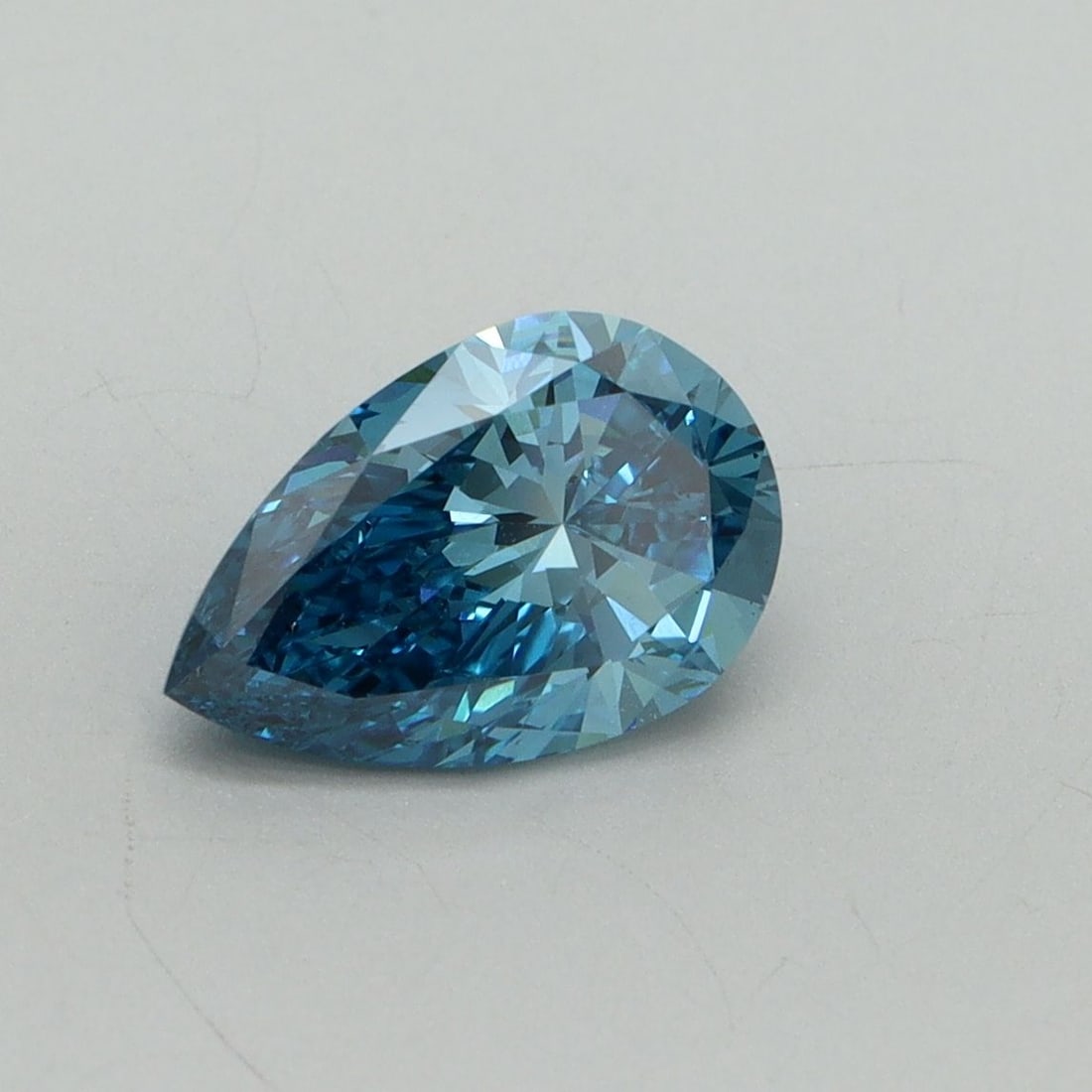 Loose Diamond - PEAR 1.28ct Fancy Vivid Blue VS2: Loose Diamond - PEAR 1.28ct Fancy Vivid Blue VS2 Source: This is a real non-mined Diamond that has been grown in a lab Shape: PEAR Carats: 1.28 Color: Fancy Vivid Blue Certification: IGI Video: