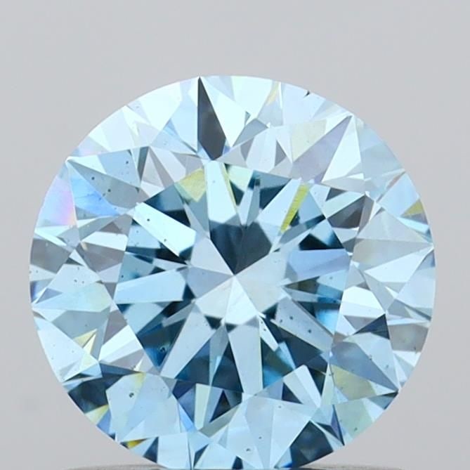 Ideal Loose Diamond - ROUND 1.01ct Fancy Vivid Blue VS2: Ideal Loose Diamond - ROUND 1.01ct Fancy Vivid Blue VS2 Source: This is a real non-mined Diamond that has been grown in a lab Shape: ROUND Carats: 1.01 Color: Fancy Vivid Blue Certification: IGI Video