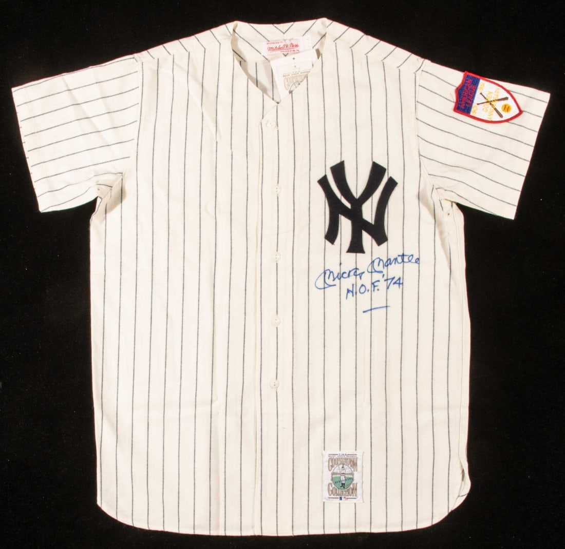Mickey Mantle Signed Yankees Jersey HOF 1974 JSA Authenticated: Mickey Mantle Signed Yankees Jersey HOF 1974 JSA Authenticated This original Mitchell & Ness pinstriped home 1951 style New York Yankees jersey features a bold signature from the legendary Mickey Mant