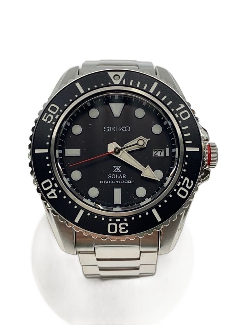 Seiko Prospex Solar Diver 200m Men's Stainless Steel Wristwatch: Seiko Prospex Solar Diver 200m Men's Stainless Steel Wristwatch This Seiko Prospex V157-0DP0 is a solar-powered diver's watch designed for men. It features a stainless steel case and band with a black