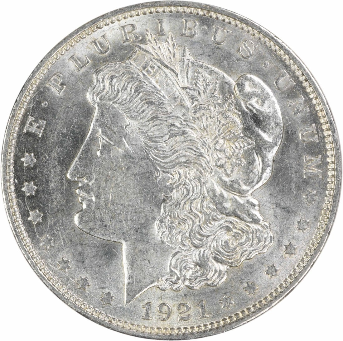 1921 Denver Morgan Dollar 90 Percent Silver AU Grade Uncertified Coin: 1921 Denver Morgan Dollar 90 Percent Silver AU Grade Uncertified Coin This 1921-D Morgan Silver Dollar is an AU (About Uncirculated) grade coin, produced at the Denver Mint. Composed of 90% silver and