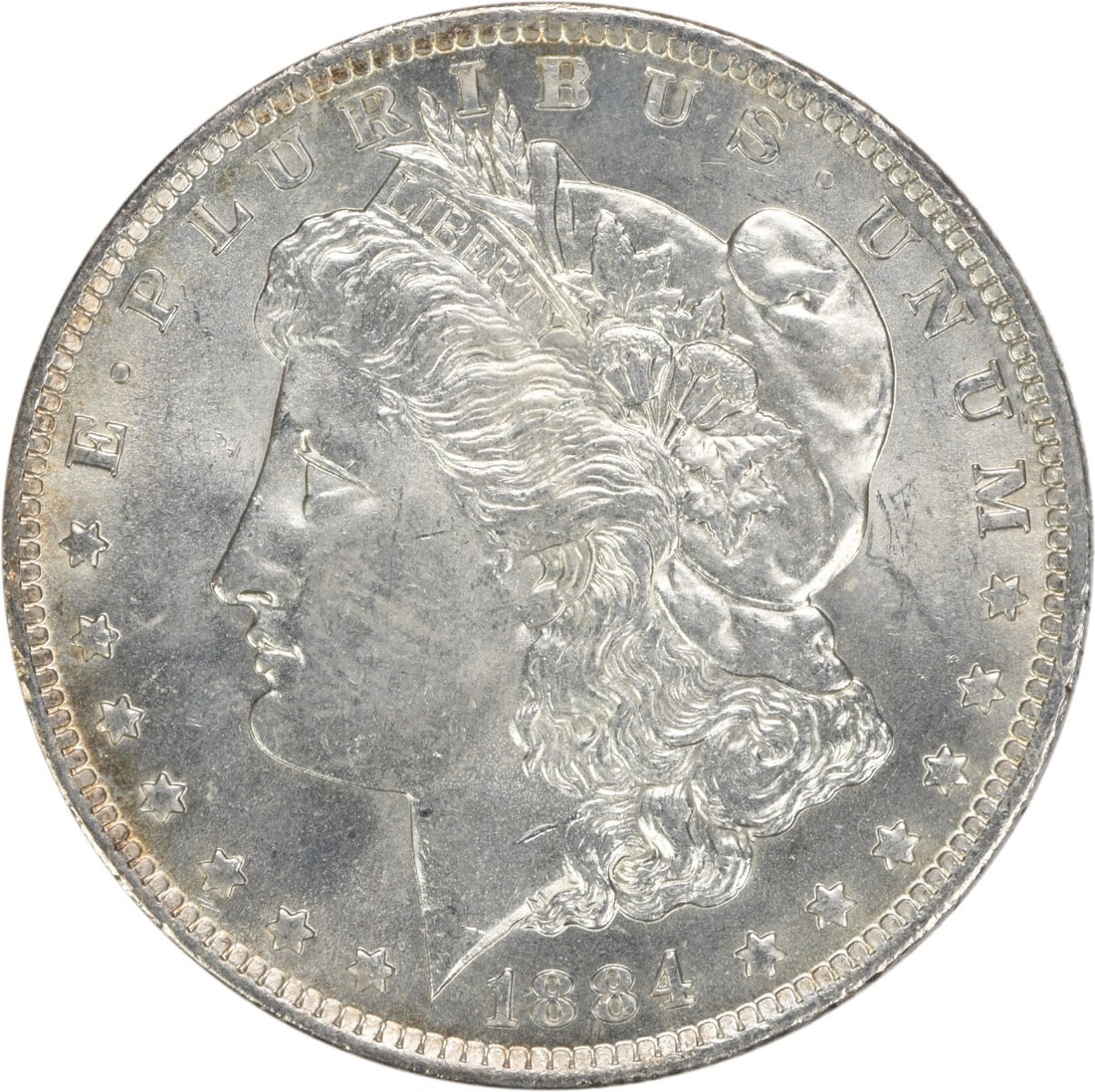 Uncirculated 1884-O Silver Morgan Dollar Brilliant Uncertified US Coin: Uncirculated 1884-O Silver Morgan Dollar Brilliant Uncertified US Coin This is an 1884-O Morgan Silver Dollar from the United States. The coin is uncirculated and features a Brilliant Uncirculated (BU