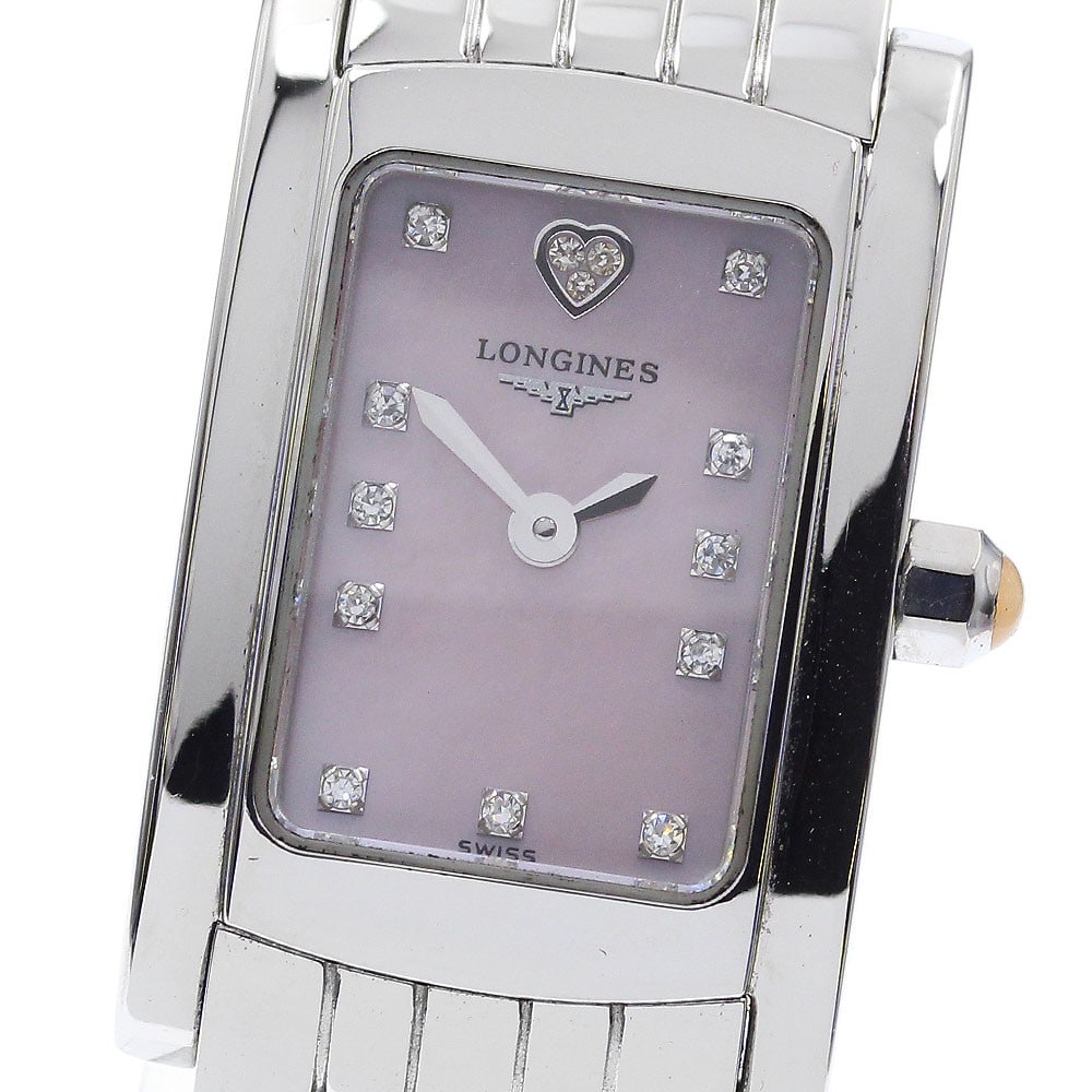 Longines Dolce Vita quartz pink shell dial ladies wristwatch: Longines Dolce Vita quartz pink shell dial ladies wristwatch This Longines Dolce Vita women's wristwatch features a stainless steel case and band, complemented by a pink shell dial. The watch is power